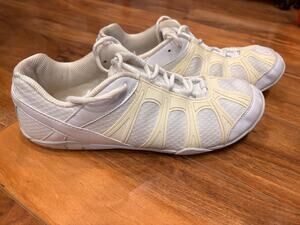 GK elite fusion cheer shoes size 9.5. White and yellow lace up.
